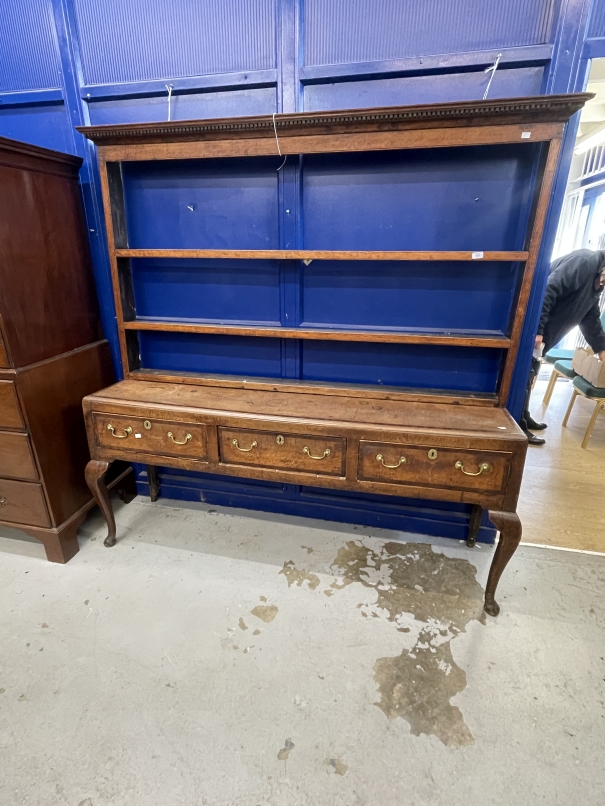 18th cent. Oak dresser the base with three drawers brass handles crossbanded with mahogany on