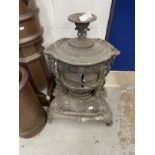 Late 19th cent. Cast iron stove by Smith and Wellstood, on three cabriole legs. Recovered from the