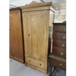 Early 20th cent. Art Nouveau pine wardrobe with single drawer below and stencilled decoration with