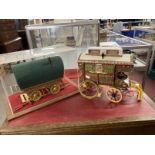 Toys & Models: Two scale model gypsy caravans, one with canvas awning in display case and the