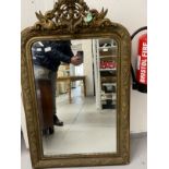 19th cent. Gilt wood over mantel with stylised dragon decoration to the top, bevelled glass.