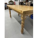 20th cent. Pine dining table on turned legs. 60ins. x 33ins. x 30ins.