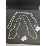 Jewellery: Opera length row of cultured pearls. One hundred and forty seven uniform cultured pearls.