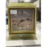 Clocks: 20th cent. Onyx Elliott of London mantel clock retailed by Mallory of Bath.