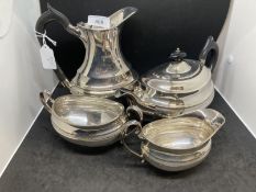 Hallmarked silver four-piece tea set comprising hot water jug, teapot, milk jug and sucre all with