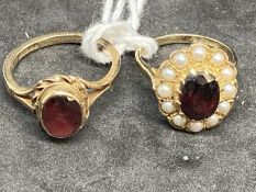 Hallmarked Jewellery: Two 9ct gold rings one set with a single garnet, ring size O, the other set