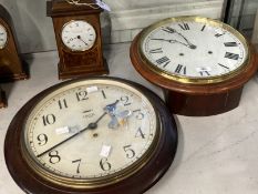 Clocks: Mahogany cased circular wall clock, spring movement, white painted dial, Roman numerals.