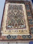 Carpets: 20th cent. Persian rug with animal and bird motifs. 79ins. x 42ins.