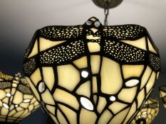 20th cent. Lighting: Tiffany style ceiling lights with shades decorated with dragonflies, in whites,