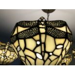 20th cent. Lighting: Tiffany style ceiling lights with shades decorated with dragonflies, in whites,