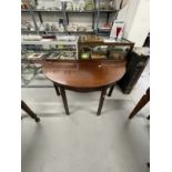 19th cent. Mahogany D end side table, the galleried top above a shaped frieze on square chamfered