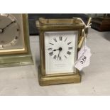 Clocks: Brass carriage clock white enamel face, Roman numerals, signed Jas Murray & Co. London/