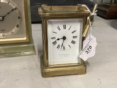 Clocks: Brass carriage clock white enamel face, Roman numerals, signed Jas Murray & Co. London/