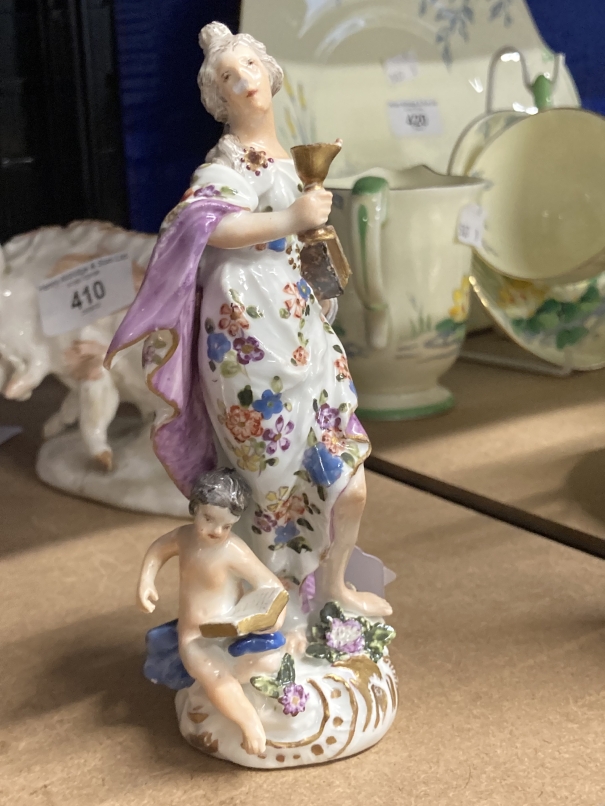 18th cent. Meissen figure of a classical maiden or muse holding a goblet in her right hand, a