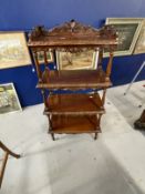 Late 19th cent. Mahogany four tier whatnot with carved gallery, each shelf with carved moulded