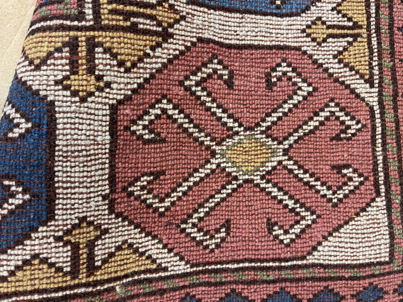 Carpets: Persian carpet with predominantly pink ground, the border with spider like motifs and large - Image 2 of 2