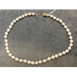 Jewellery: Baroque pearls (44) in 9ct hallmarked cage clasp. 18½ins.