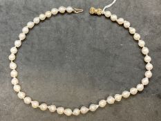 Jewellery: Baroque pearls (44) in 9ct hallmarked cage clasp. 18½ins.