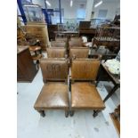 20th cent. Elizabethan style set of eight oak chairs with leather seats and monogrammed brass