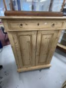 Late 19th/early 20th cent. Pine cupboard, single drawer over two doors with shelves within. 41ins. x