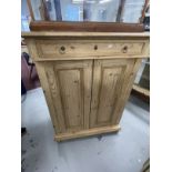 Late 19th/early 20th cent. Pine cupboard, single drawer over two doors with shelves within. 41ins. x