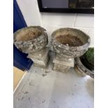 Gardenalia: Concrete garden urns on square bases a pair (29ins. x 16ins), a single round urn, a pair