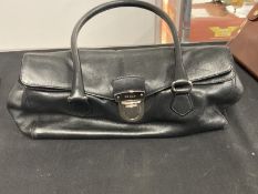 Fashion Handbags: Prada handbag, black shoulder bag, white metal hardware, Prada engraved on clip