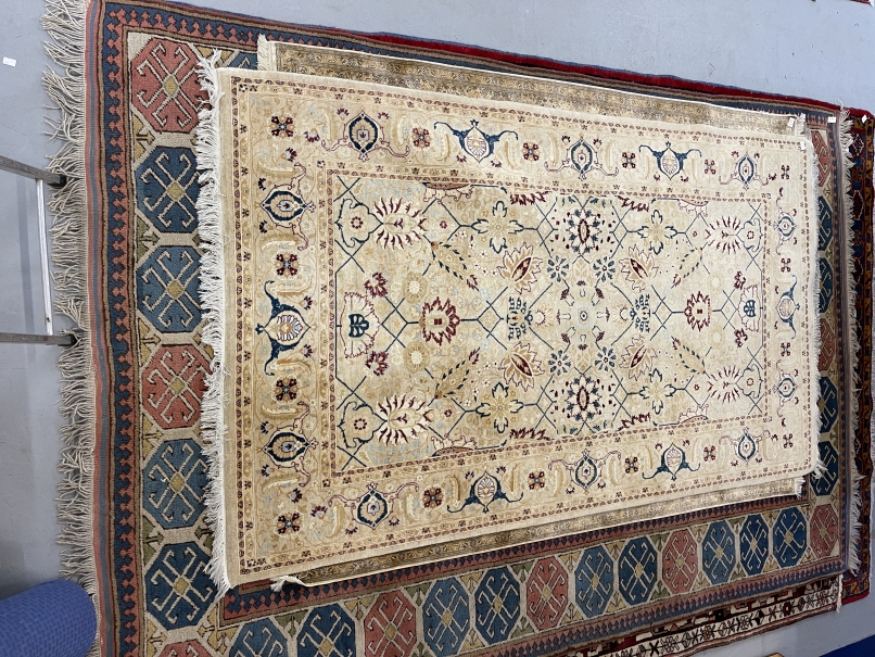 Carpets: 20th cent. Persian rug cream ground geometric motifs. 93ins. x 55ins.
