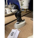 20th cent. Ceramics: Felix the cat kept on walking, on whit ceramic base. 4ins.