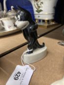 20th cent. Ceramics: Felix the cat kept on walking, on whit ceramic base. 4ins.