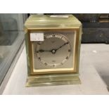 Clocks: 20th cent. Onyx Elliott of London mantel clock retailed by Mallory of Bath.