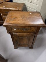 20th cent. Oak bedside cupboards, a pair with single drawer above a cupboard door on square block