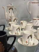 Art Deco Ceramics: Royal Doulton 'Eden' (Tall Trees) cream gilt and coloured coffee set, pattern