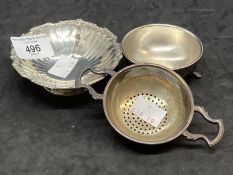 Hallmarked Silver: Tea strainer and bowl, and a small bon bon dish. Weight 4.4oz.