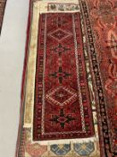 Carpets: Iranian runner with small central green motif. 118ins. x 32ins. Plus a small Iranian