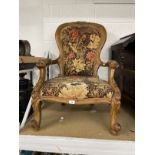 Victorian walnut chair cabriole legs with scroll open arms, shaped carved back. Width 26ins. Depth