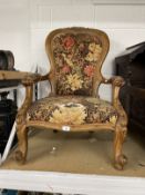 Victorian walnut chair cabriole legs with scroll open arms, shaped carved back. Width 26ins. Depth