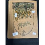 Postcards: Edwardian album containing many cards including pre-WWI France, New York, the converted