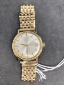 Watches: Hallmarked gold Omega gentleman's 1968 DeVille Seamaster with 9ct gold bracelet. 60g.
