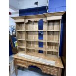 Early 20th cent. Pine dresser with five drawers, brass handles, on turned legs with a set of oak