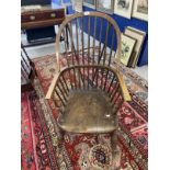19th cent. Ash and elm farmhouse Windsor elbow chair, hooped back with continuous arm above,
