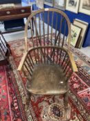 19th cent. Ash and elm farmhouse Windsor elbow chair, hooped back with continuous arm above,
