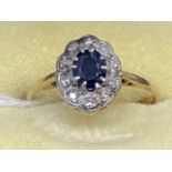 Jewellery: Yellow metal ring set with an oval cut sapphire, estimated weight 0.45ct, surrounded by