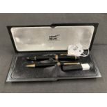 Pens: Mont Blanc black and gilt cased fountain pen, pencil and spare leads.