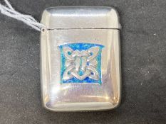 Liberty & Co: Silver and enamel vesta case designed by Archibald Knox cast in low relief with Celtic