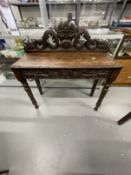 Late 19th/early 20th cent. Oak buffet with stylised back carved in the shape of a face. 15ins. x
