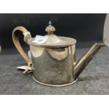 Hallmarked Silver: Bachelor pistol shaped teapot hallmarked London 1911. Weight 8.93oz.