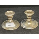 Hallmarked Silver: Pair of filled mantel candlesticks with key decoration, hallmarked Chester