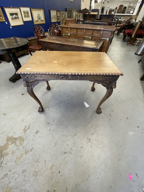 Late 19th/early 20th cent. Oak side table of good quality with stylised classical figures to the