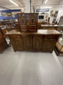 20th cent. Country style oak sideboard with two drawers over two side cupboards, the large central